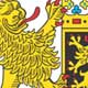 The Bavarian coat of arms dating from 1950 demonstrates the state's regional variety. The golden lion in the black field on the top left stands for the Palatine county bei Rhein, which was given to the Bavarian duke Ludwig I in fee in 1214. For centuries this symbol was shared by the Old Bavarian and Palatine Wittelsbachers. Since the Rhenish Palatinate ceased to be part of Bavaria in 1946, the Palatine lion now refers to the government district of the Upper Palatinate, and the other part to the form Palatine county. The "Franconian rake" on the top right dates back to the seal of the prince-bishops of Würzburg in 1410, and symbolises today's three Franconian administrative districts. The blue panther on the bottom left refers to a count palatine von Ortenburg, who was once based in Old Bavaria; it was later adopted by the Wittelsbachers. Today the blue panther represents the two Old Bavarian administrative districts of Upper and Lower Bavaria. The three black lions on the bottom right were taken from the coat of arms of the Hohenstaufen, the former dukes of Swabia, and represent the administrative district of Swabia. The heart-shield with the blue-and-white lozenges was originally used by the Counts of Bogen before being adopted by the Wittelsbachers in 1247. The lozenge motif, combined with the people's crown on the upper edge of the coat of arms (first introduced in 1923 to symbolise the sovereignty of the people), serve as a "miniature coat of arms". White and blue are the Bavarian state colours.